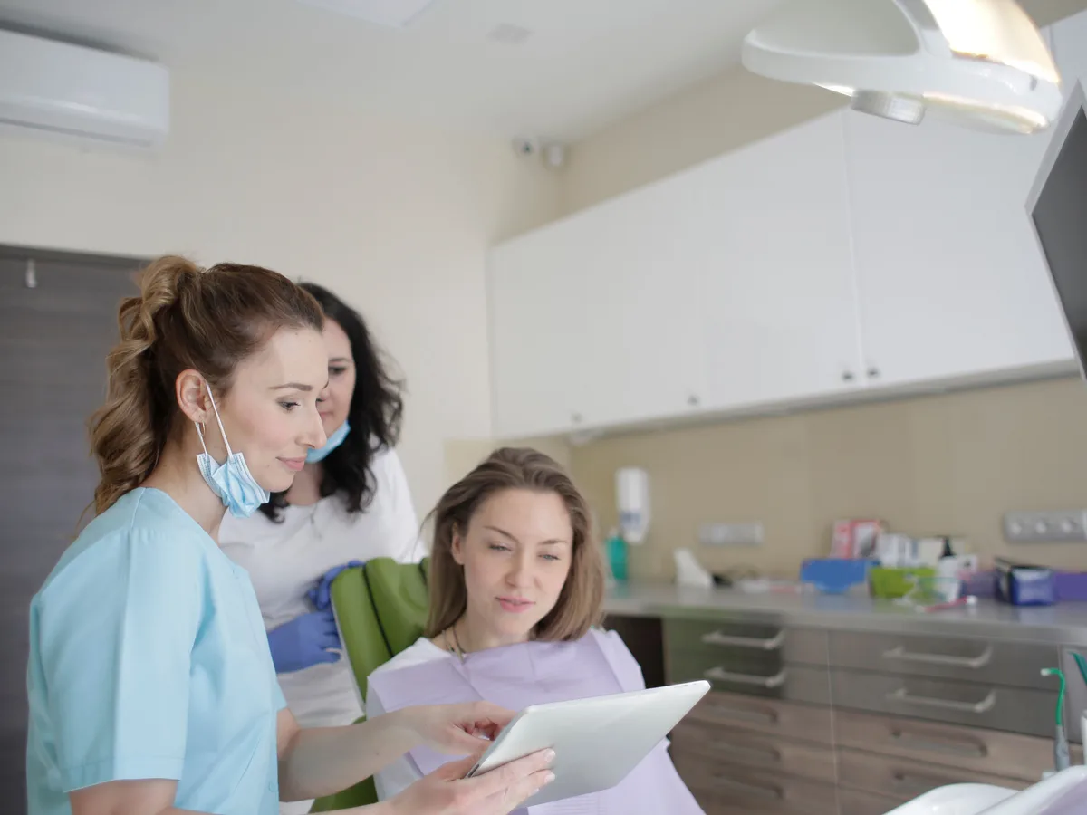 Dental consultation using a tablet for bringing implant planning details in Blackburn North