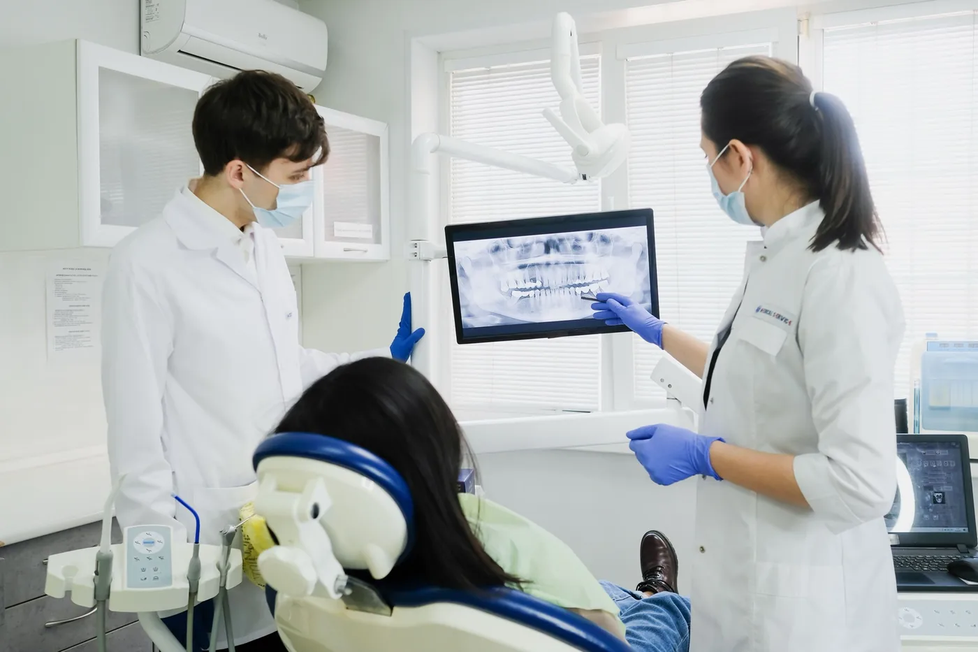 Dental X-ray discussion scene used for Orchard Smiles Dental Surgery service information